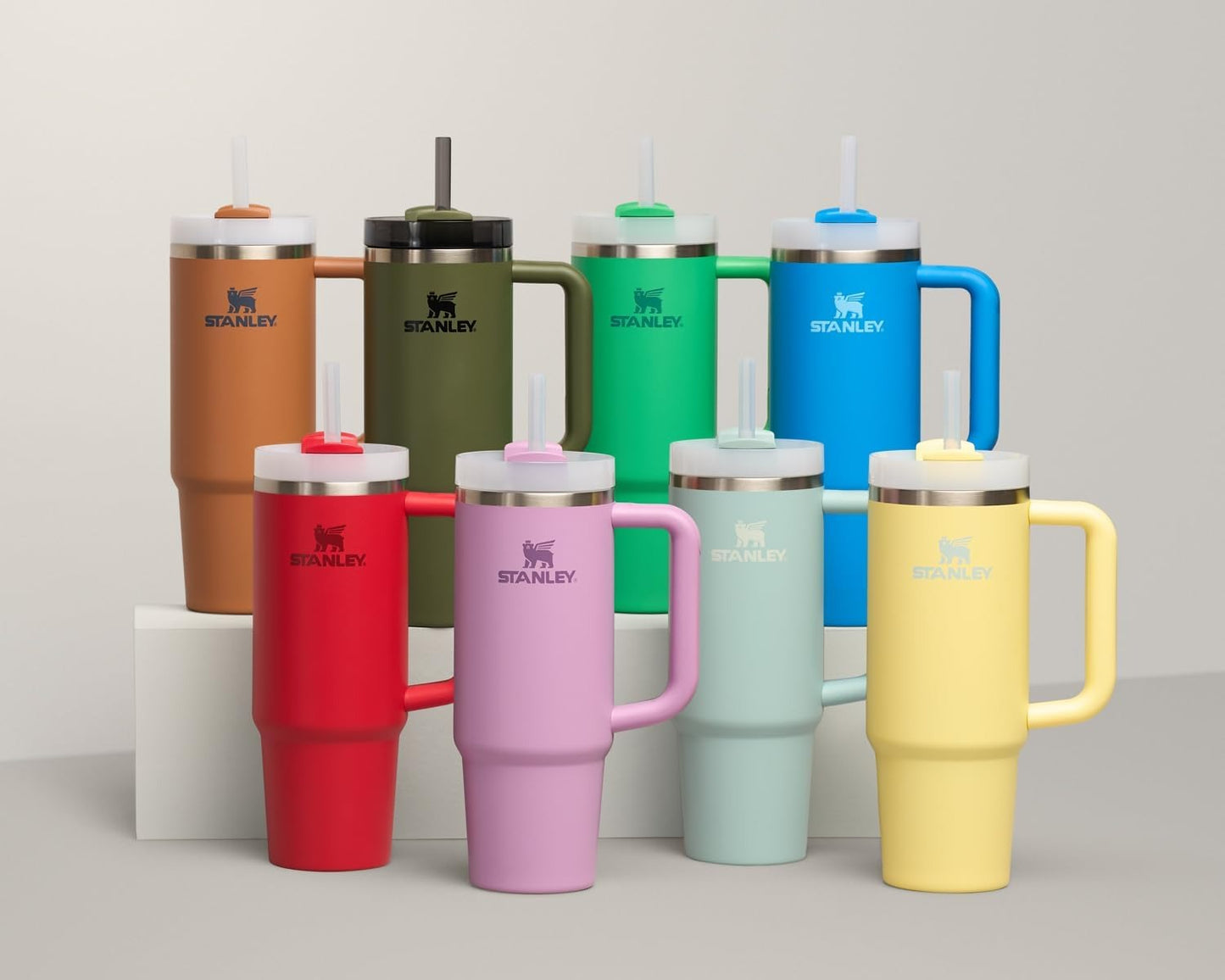 STANLEY Quencher H2.0 Tumbler with Handle and Straw 20 oz | Flowstate 3-Position Lid | Cup Holder Compatible for Travel | Insulated Stainless Steel Cup | BPA-Free | Cream 2.0